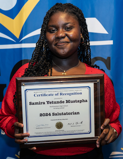 Samira-Mustapha-Holding-Sal-Plaque.png