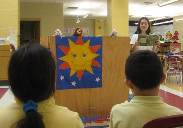 RELA-students-listening-to-story.jpg