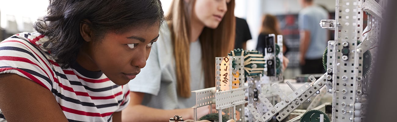 teens studying engineering with manipulatives