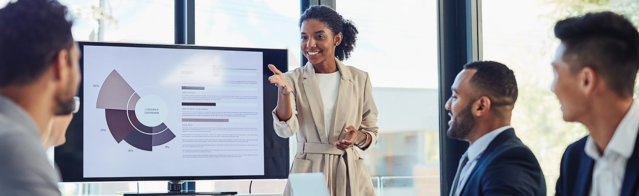 diverse business meeting with presentation screen